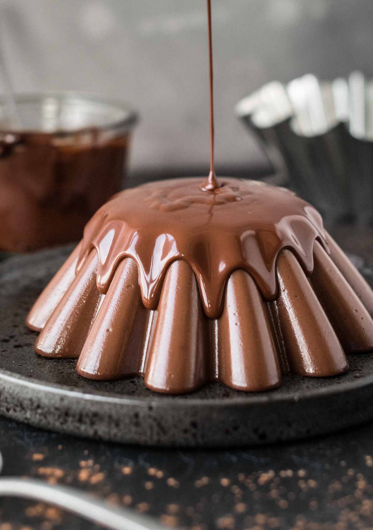 chocolate pudding into a different mold and topped with melted chocolate