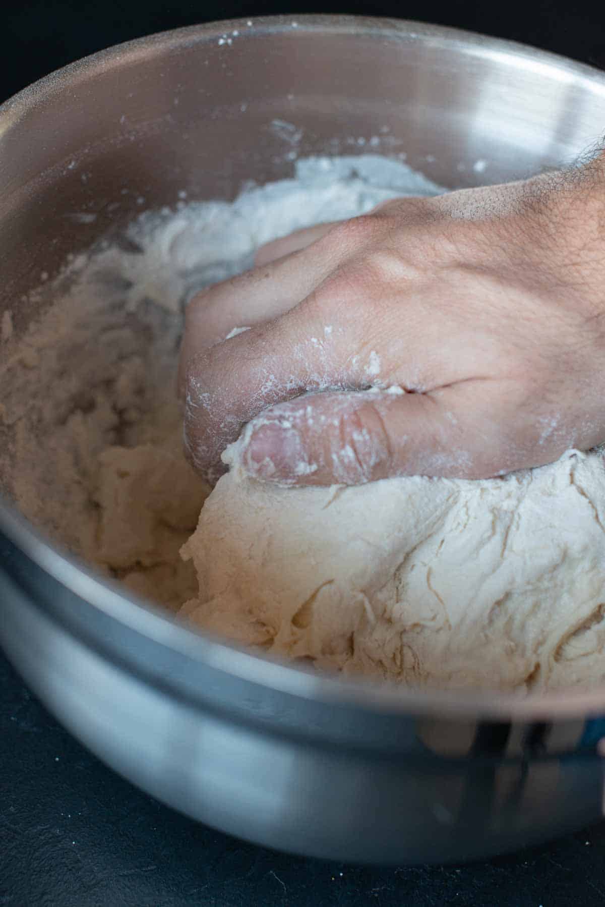 picture showing the kneading of the dough