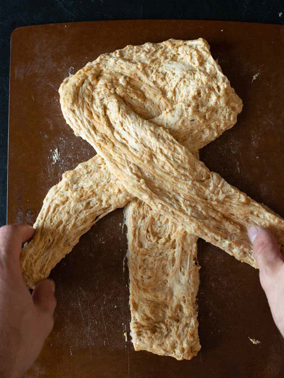 this image shows how to braid the dough.