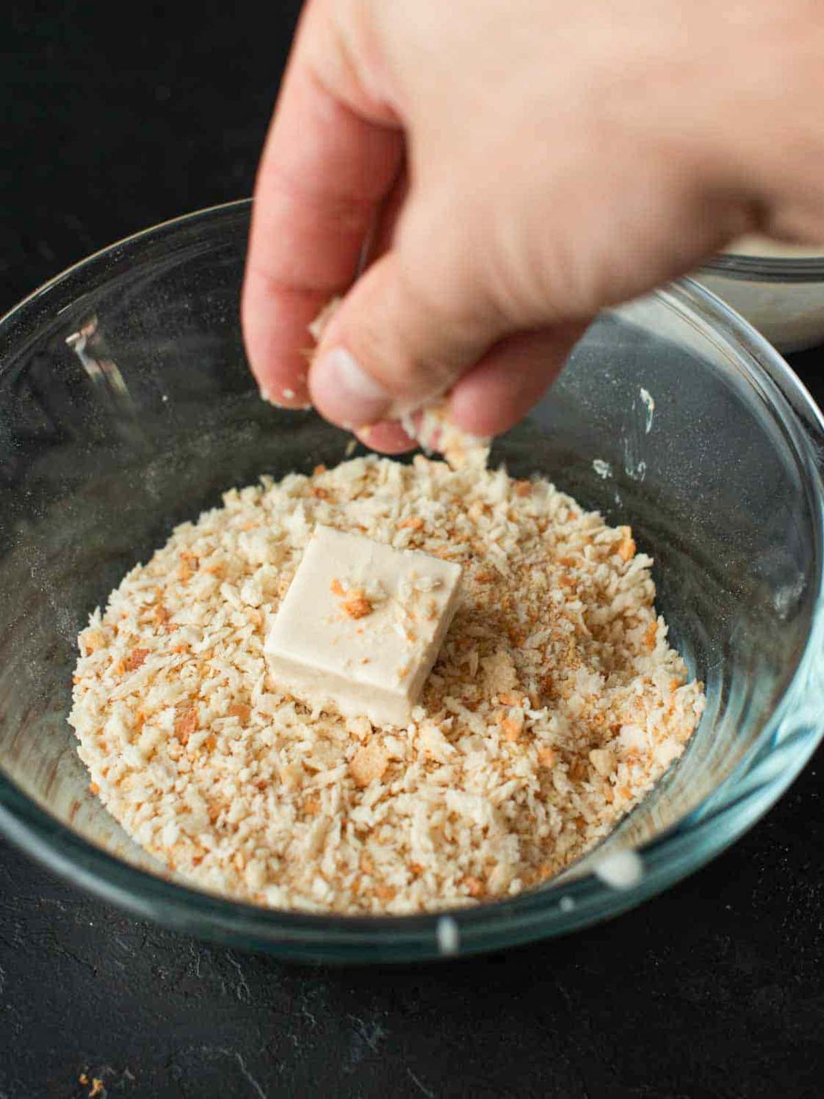 the image shows the tofu cube before getting covered with breadcrumbs.