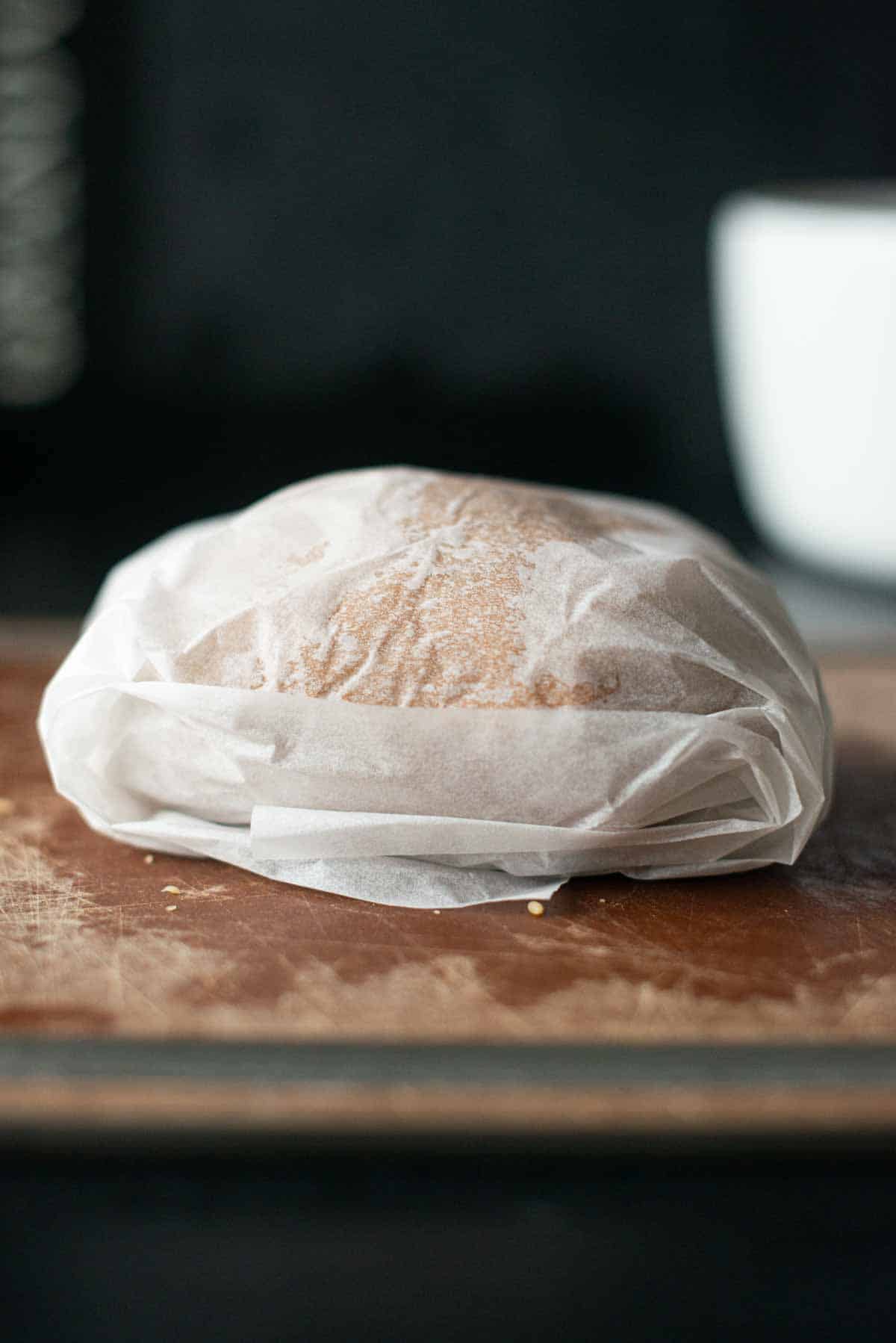 Image: vegan chicken wrapped with baking paper before cooking