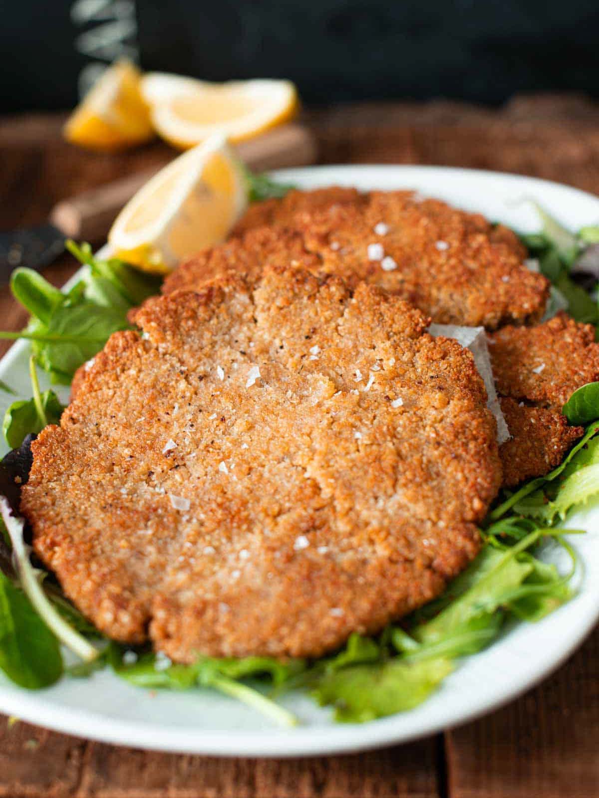 the image shows vegan oat schnitzels ready to be served.