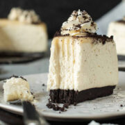 image of a slice of vegan white chocolate cheesecake