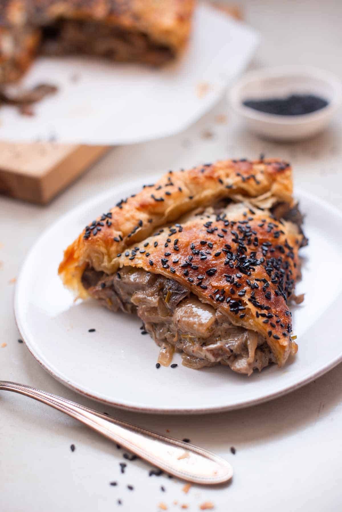 image: slice of mushroom pie on a dish