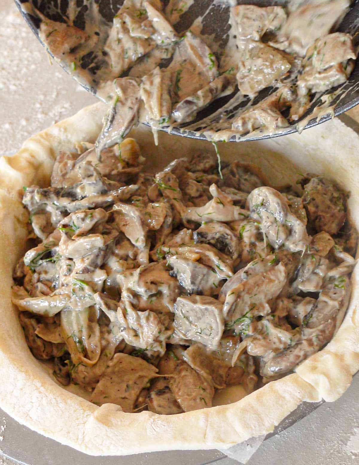 image: filling the mushroom pie with the filling