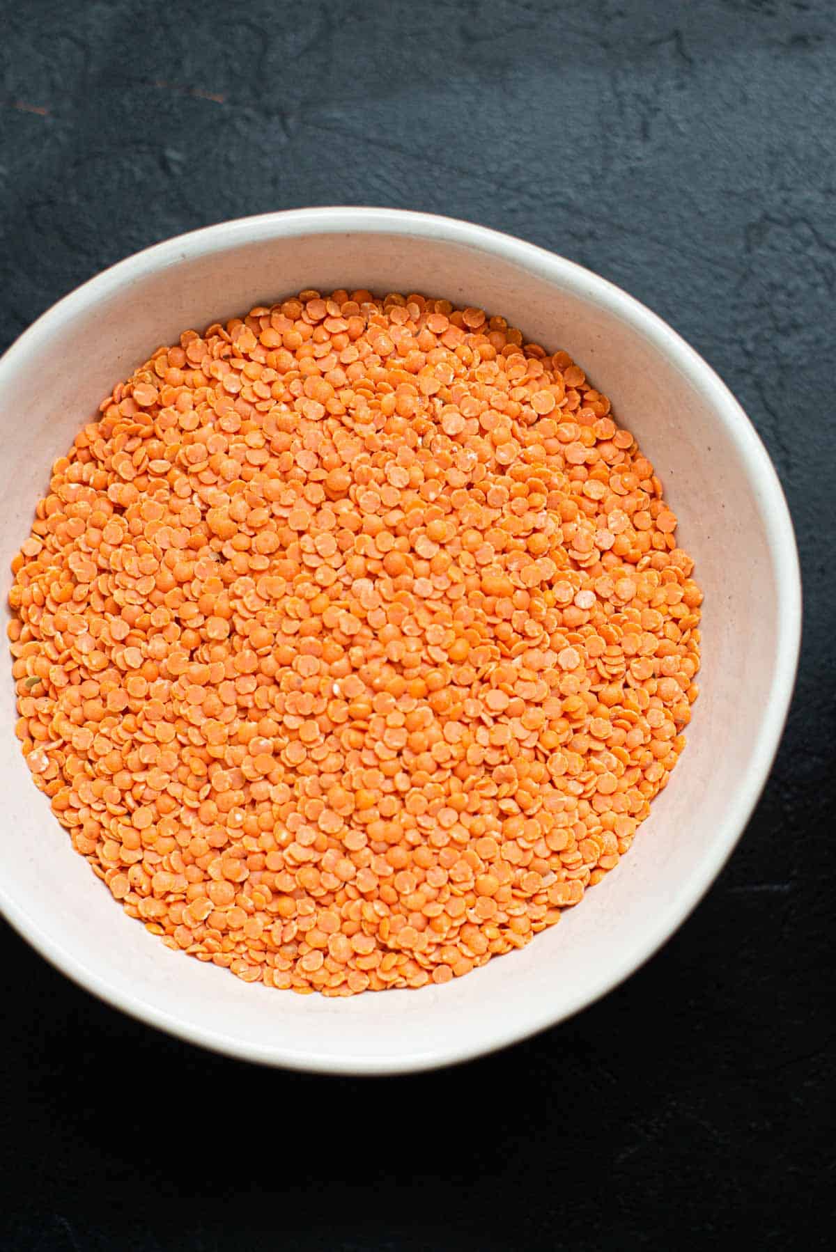 Image: red lentils into a bowl