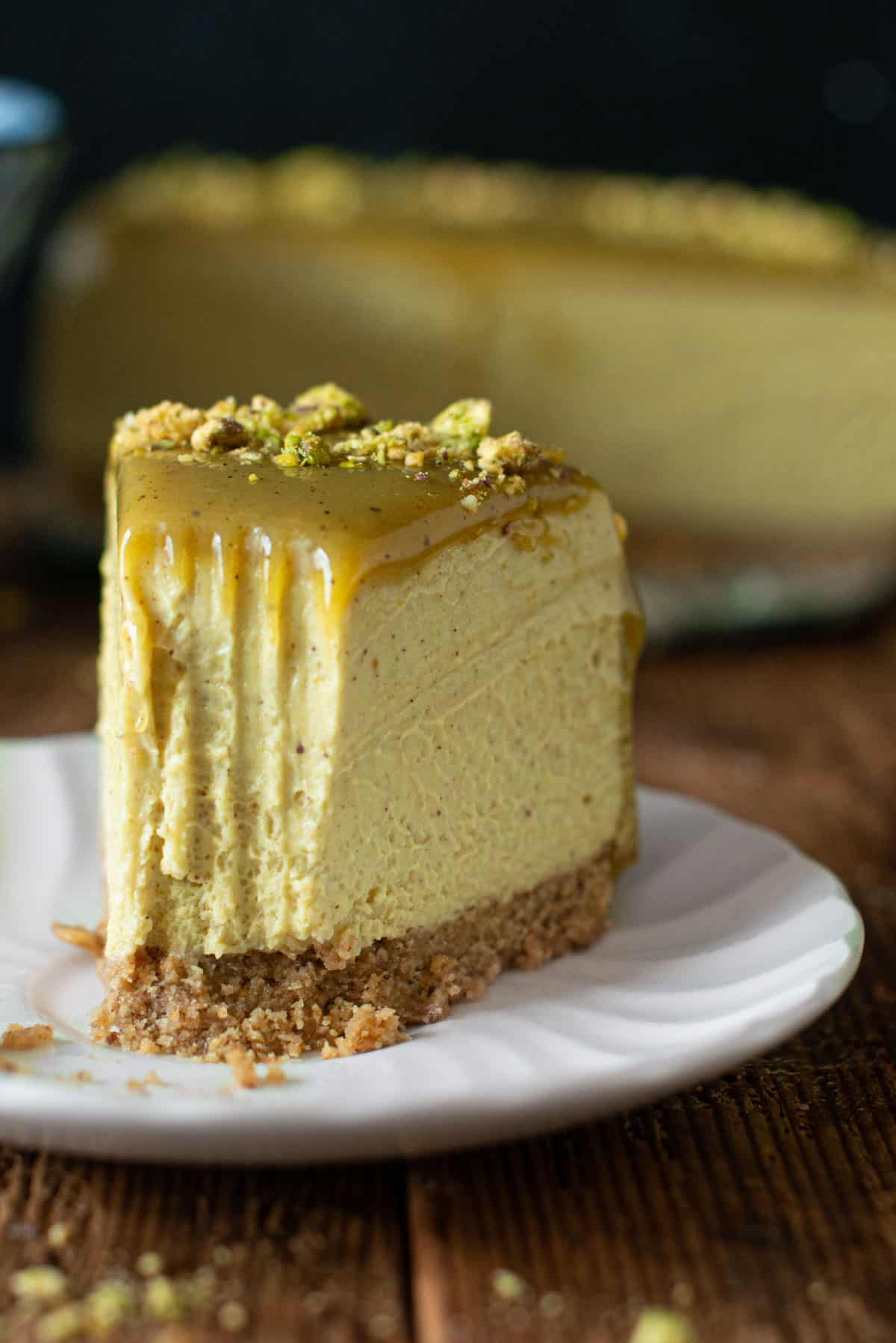 image: vegan pistachio cheesecake slice