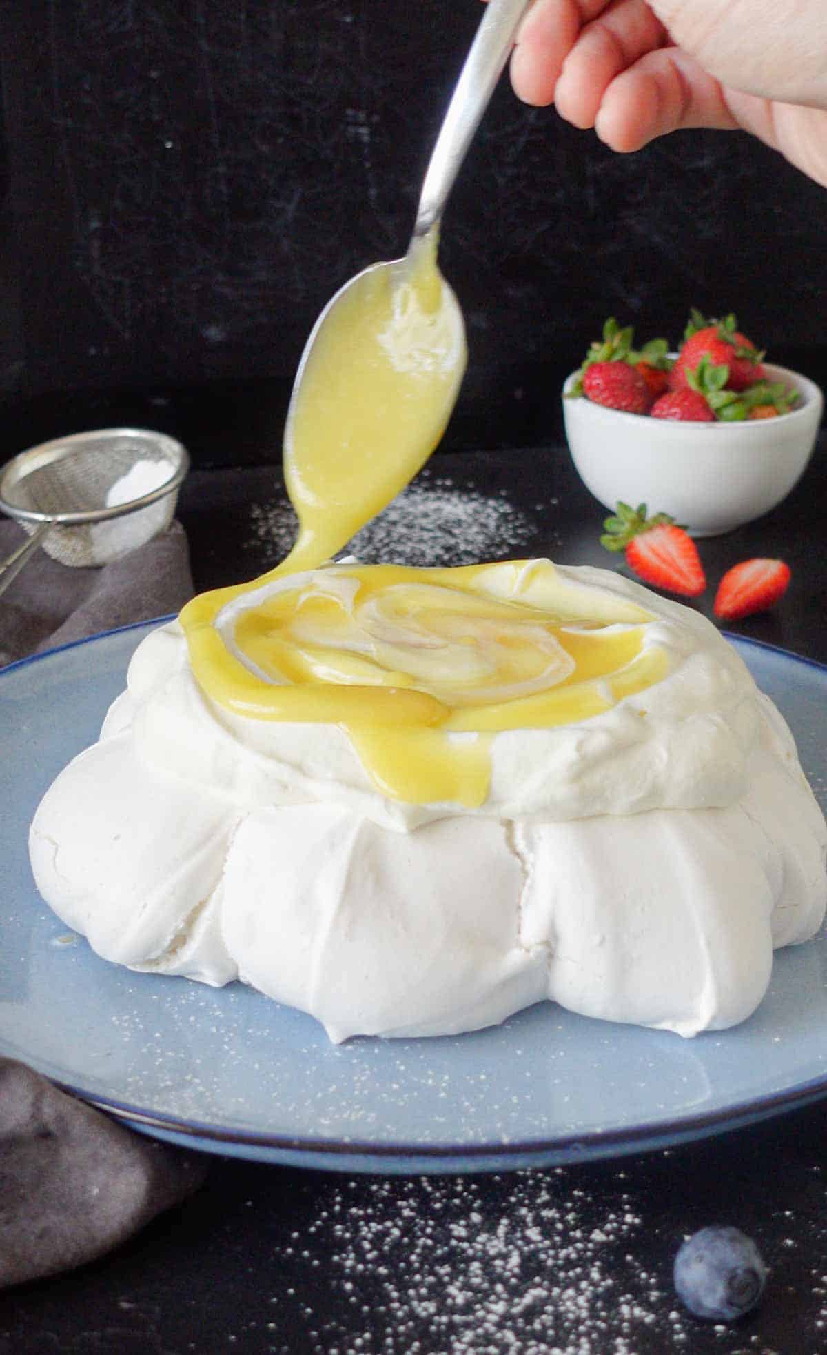 Image: vegan pavlova getting assembled