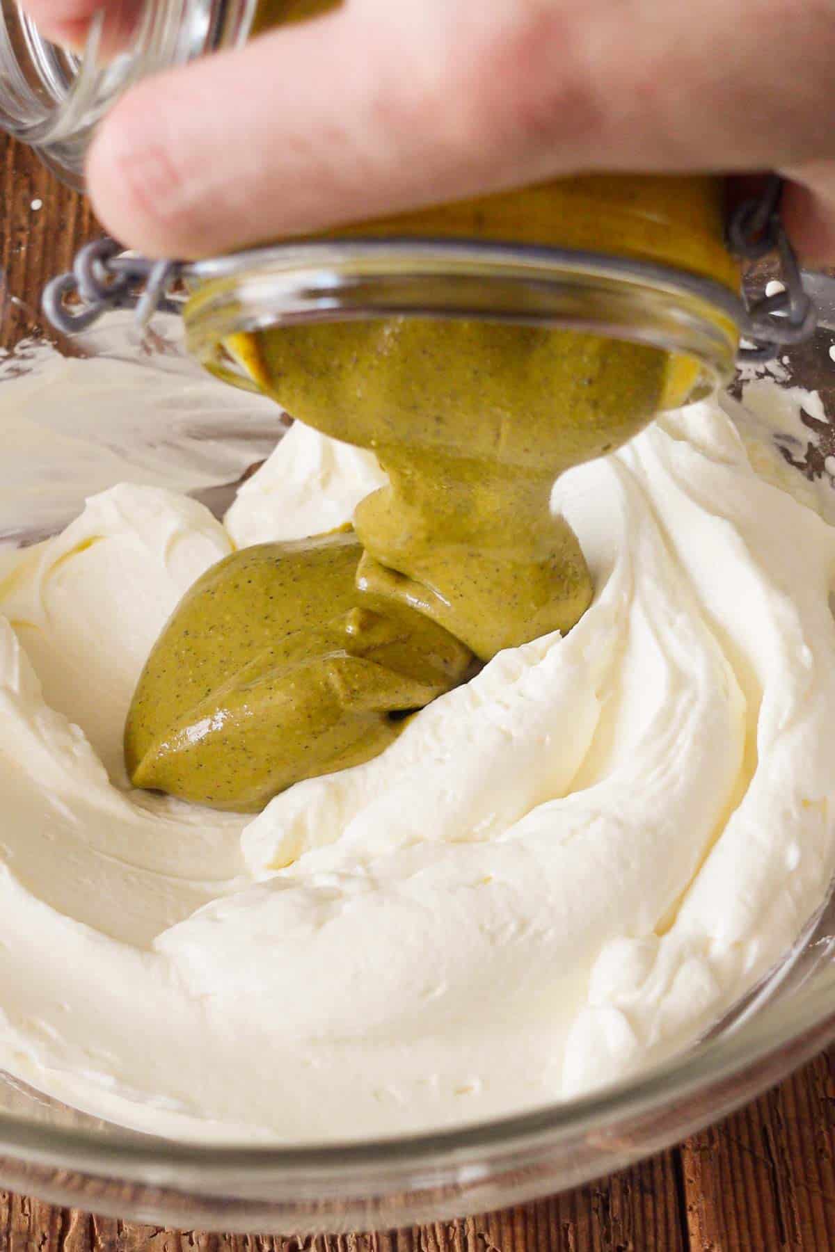 image: vmixing cream cheese with pistachio butter