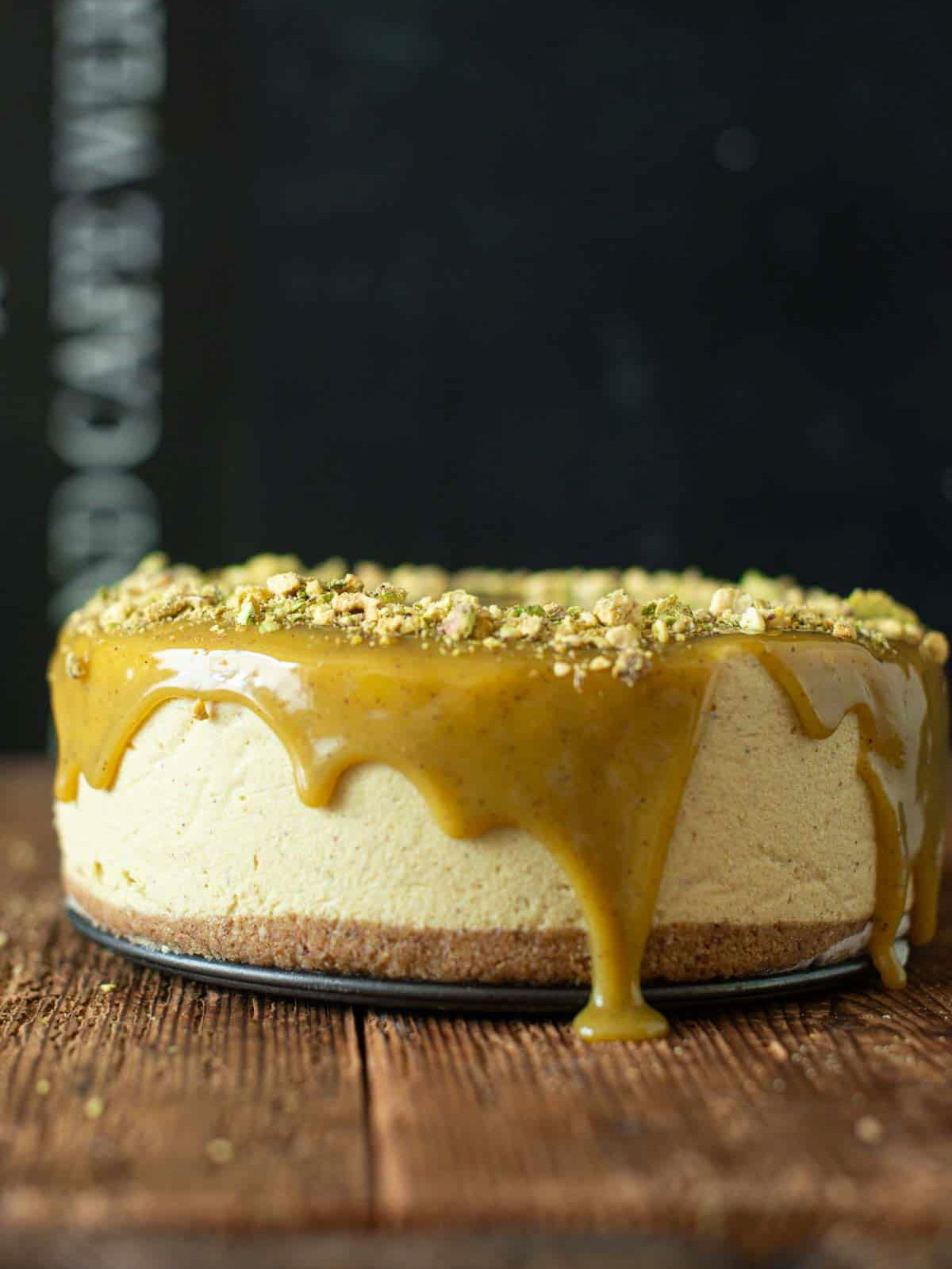 image of the cheesecake topped with ganache