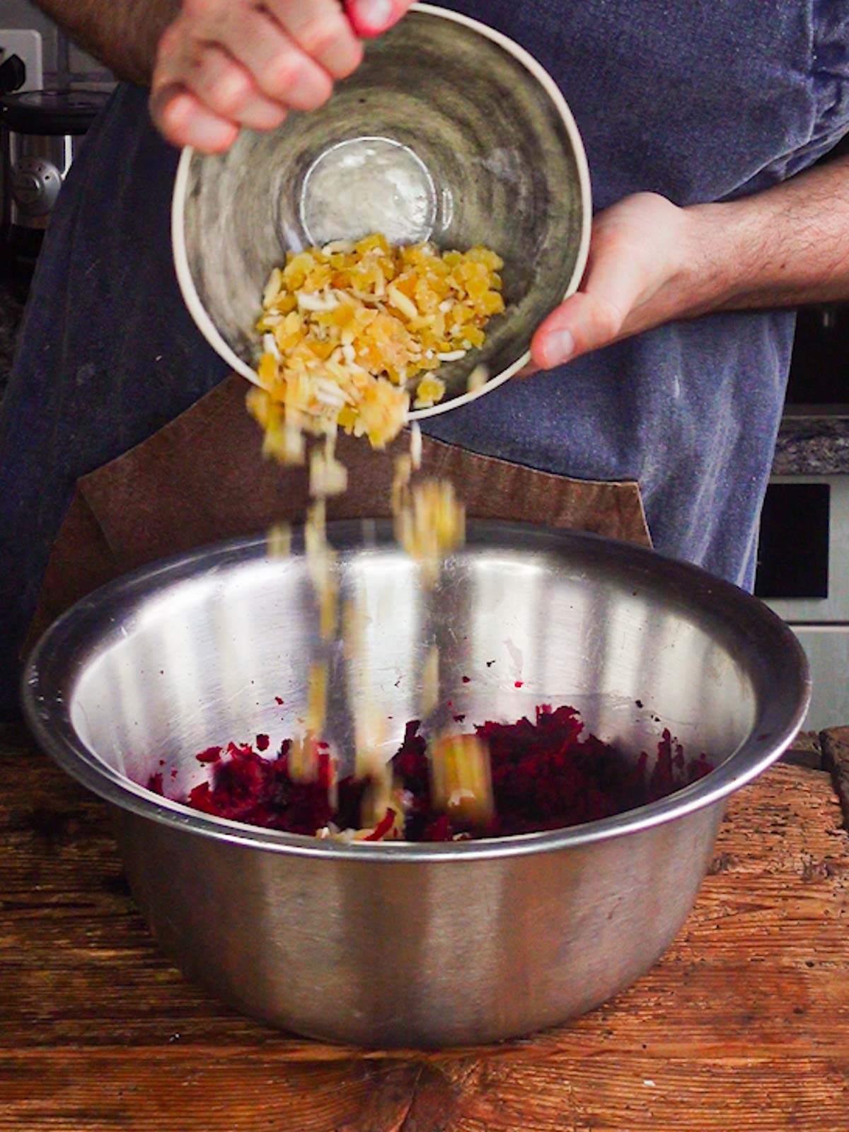 nuts, ginger and beetroot getting added to the dry mixture